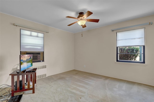 31 Amby Ave, Plainview, NY 11803 - spare room with a ceiling fan, carpet, and radiator heating unit