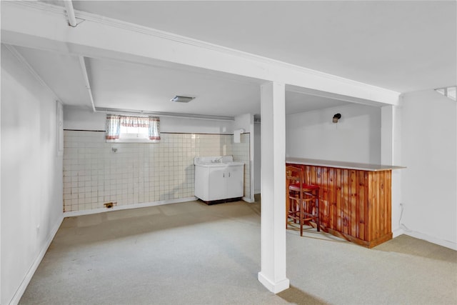 31 Amby Ave, Plainview, NY 11803 - below grade area with a bar, carpet floors, and tile walls