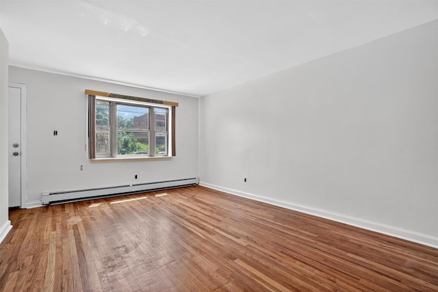 1025 E 229th St Unit B, Bronx, NY 10466 - empty room with baseboard heating and wood finished floors