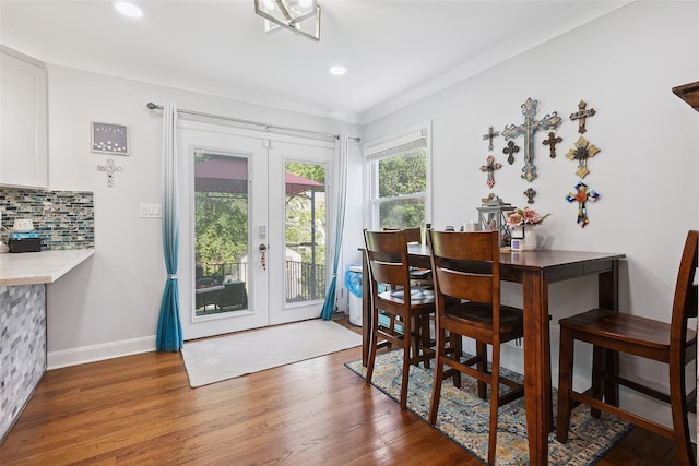 69 Ardell Rd, Bronxville, NY 10708 - dining room with wood finished floors, french doors, and recessed lighting