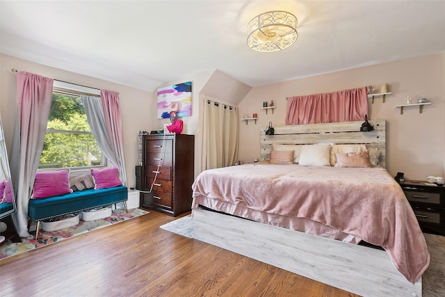 69 Ardell Rd, Bronxville, NY 10708 - bedroom with vaulted ceiling and wood finished floors