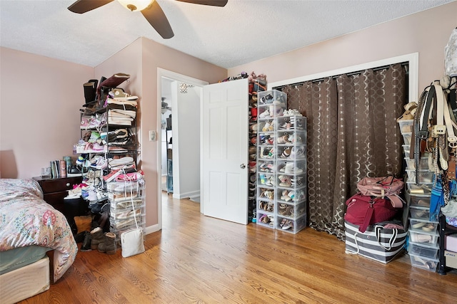 69 Ardell Rd, Bronxville, NY 10708 - bedroom featuring wood finished floors, ceiling fan, and a textured ceiling