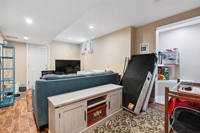 69 Ardell Rd, Bronxville, NY 10708 - living area featuring wood finished floors and recessed lighting