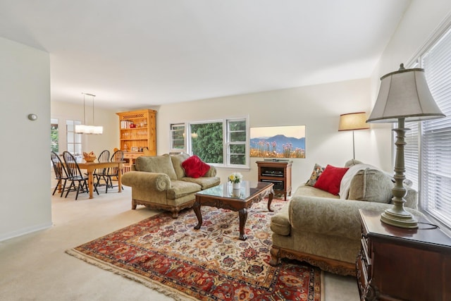 4 Aldine Park, Nyack, NY 10960 - living room featuring plenty of natural light, carpet floors, and a chandelier
