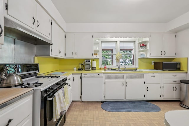 4 Aldine Park, Nyack, NY 10960 - kitchen featuring range with gas stovetop, dishwasher, black microwave, open shelves, and under cabinet range hood