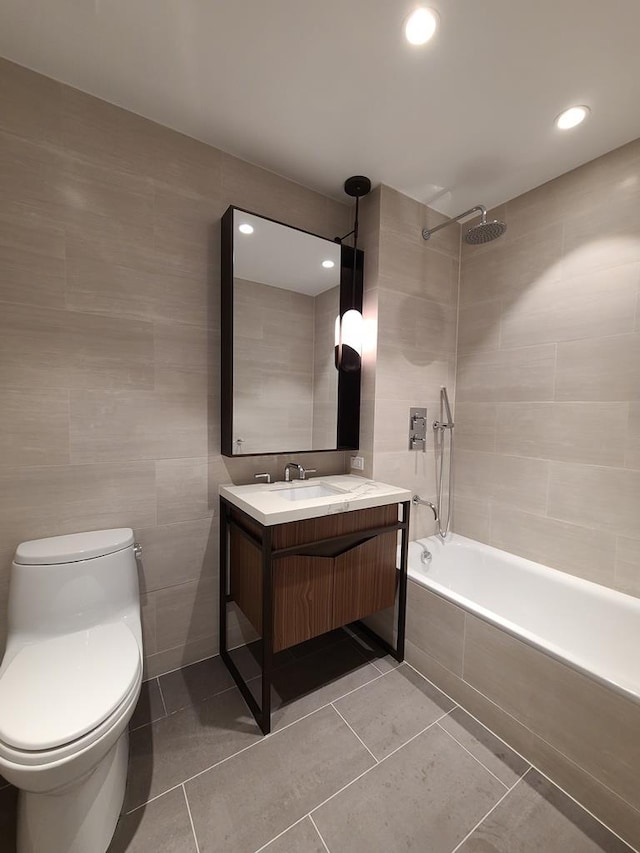 133-27 39th Ave, Flushing, NY 11354 - full bathroom featuring tiled shower / bath, vanity, tile walls, tile patterned floors, and recessed lighting