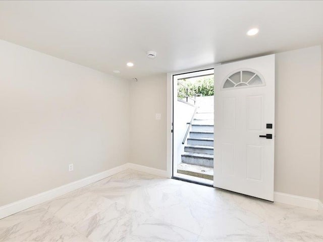 180 Evelyn Rd, Mineola, NY 11501 - entryway with recessed lighting, light marble finish flooring, and stairway