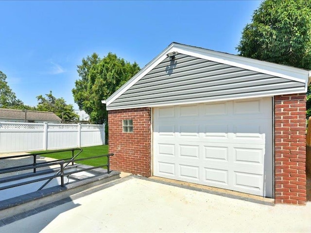180 Evelyn Rd, Mineola, NY 11501 - detached garage featuring driveway