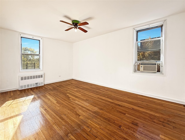 1480 Thieriot Ave Unit 5L, Bronx, NY 10460 - unfurnished room featuring radiator, hardwood / wood-style flooring, a ceiling fan, and healthy amount of natural light