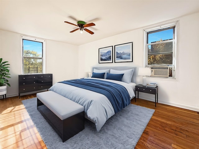 1480 Thieriot Ave Unit 5L, Bronx, NY 10460 - bedroom with wood finished floors, cooling unit, and ceiling fan