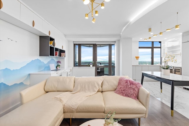 11201 Queens Blvd Unit 18D, Forest Hills, NY 11375 - living area featuring light wood-type flooring and a chandelier
