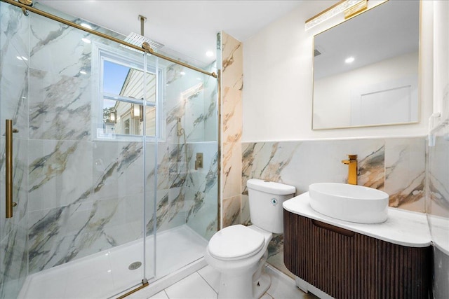 247 N Greene Ave, Lindenhurst, NY 11757 - bathroom with tile walls, a marble finish shower, vanity, and wainscoting
