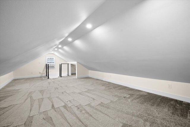 247 N Greene Ave, Lindenhurst, NY 11757 - bonus room with vaulted ceiling, light colored carpet, and recessed lighting