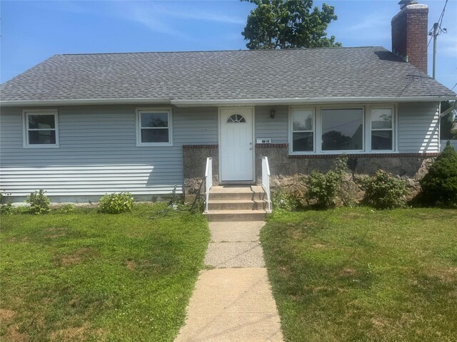 19 Dakota St, Hicksville, NY 11801 - bungalow with roof with shingles, a chimney, and a front yard