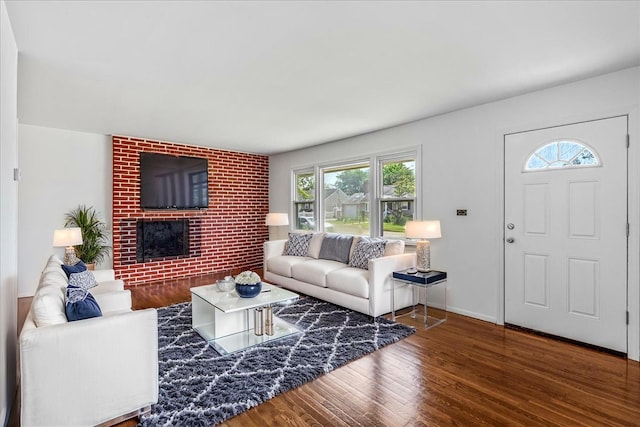19 Dakota St, Hicksville, NY 11801 - living area with wood finished floors and a fireplace
