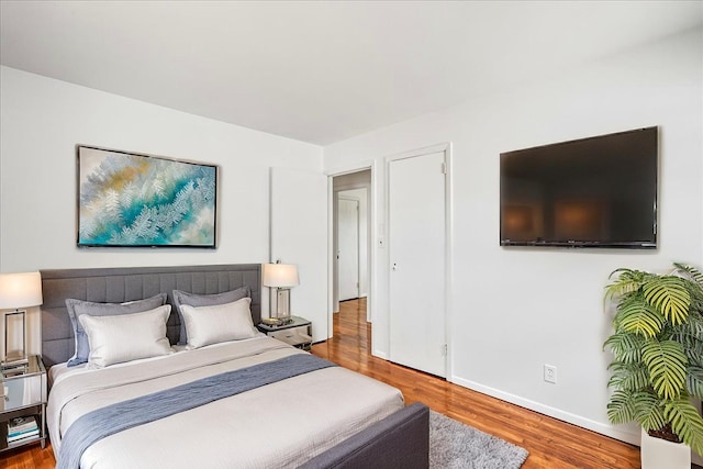 19 Dakota St, Hicksville, NY 11801 - bedroom with wood finished floors and baseboards