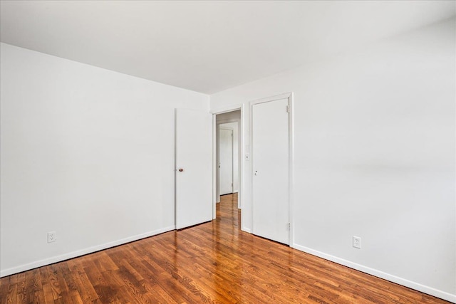 19 Dakota St, Hicksville, NY 11801 - unfurnished room featuring wood finished floors and baseboards