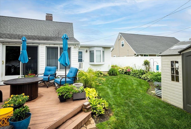 86 Shepherd Ln, Levittown, NY 11756 - wooden terrace featuring a storage unit and an outdoor hangout area