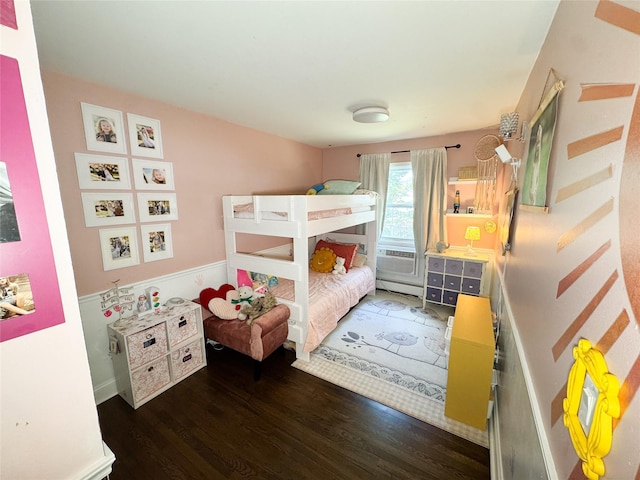 5 Church Ln Unit I, Valley Cottage, NY 10989 - bedroom featuring wood finished floors and a baseboard heating unit
