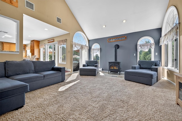 182 Otter Rd, Campbell Hall, NY 10916 - carpeted living area with high vaulted ceiling, healthy amount of natural light, a wood stove, and recessed lighting