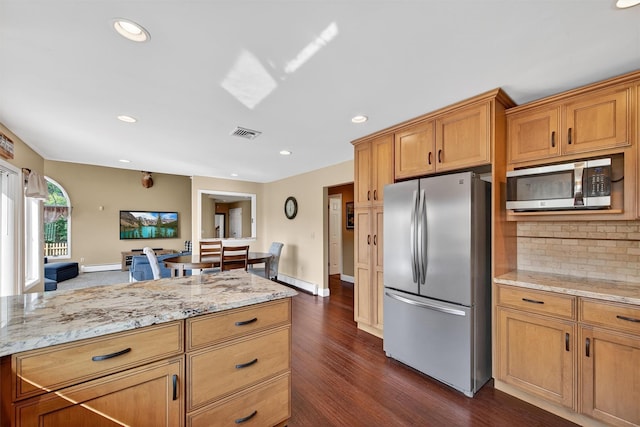 182 Otter Rd, Campbell Hall, NY 10916 - kitchen with stainless steel appliances, backsplash, recessed lighting, dark wood-type flooring, and light stone countertops