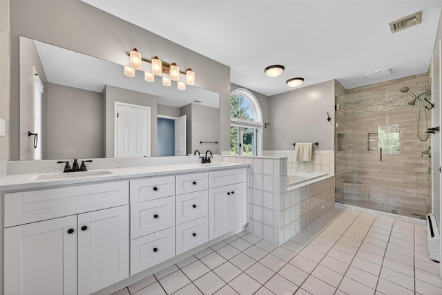 182 Otter Rd, Campbell Hall, NY 10916 - bathroom with a stall shower, tile patterned floors, double vanity, and a bath