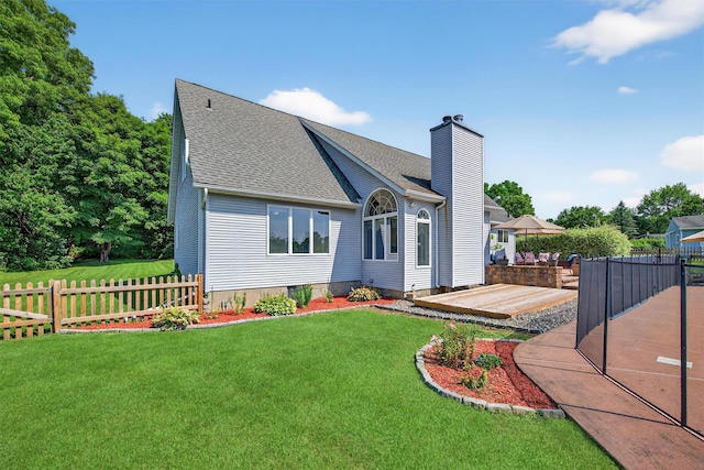 182 Otter Rd, Campbell Hall, NY 10916 - rear view of house with a chimney, roof with shingles, a patio area, and a deck