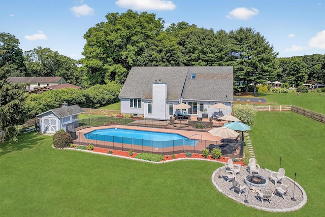 182 Otter Rd, Campbell Hall, NY 10916 - view of pool with an outdoor fire pit, a fenced backyard, a shed, and a patio