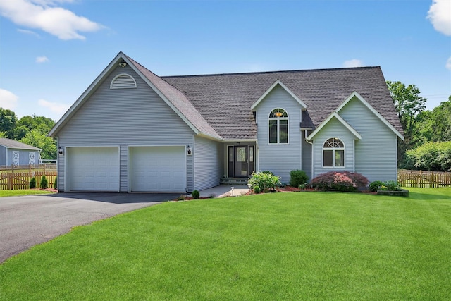 182 Otter Rd, Campbell Hall, NY 10916 - view of front of home featuring asphalt driveway, an attached garage, and a shingled roof