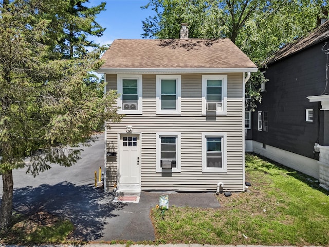 17 Sterling St, Middletown, NY 10940 - view of front facade with a chimney, a front lawn, and roof with shingles