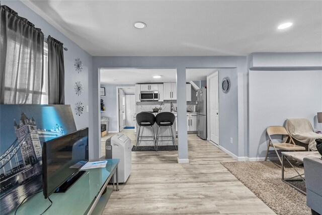 17 Sterling St, Middletown, NY 10940 - living room with light wood-style flooring and recessed lighting