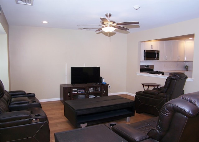 8 Country View Ln, Middle Island, NY 11953 - living room featuring ceiling fan, wood finished floors, and recessed lighting