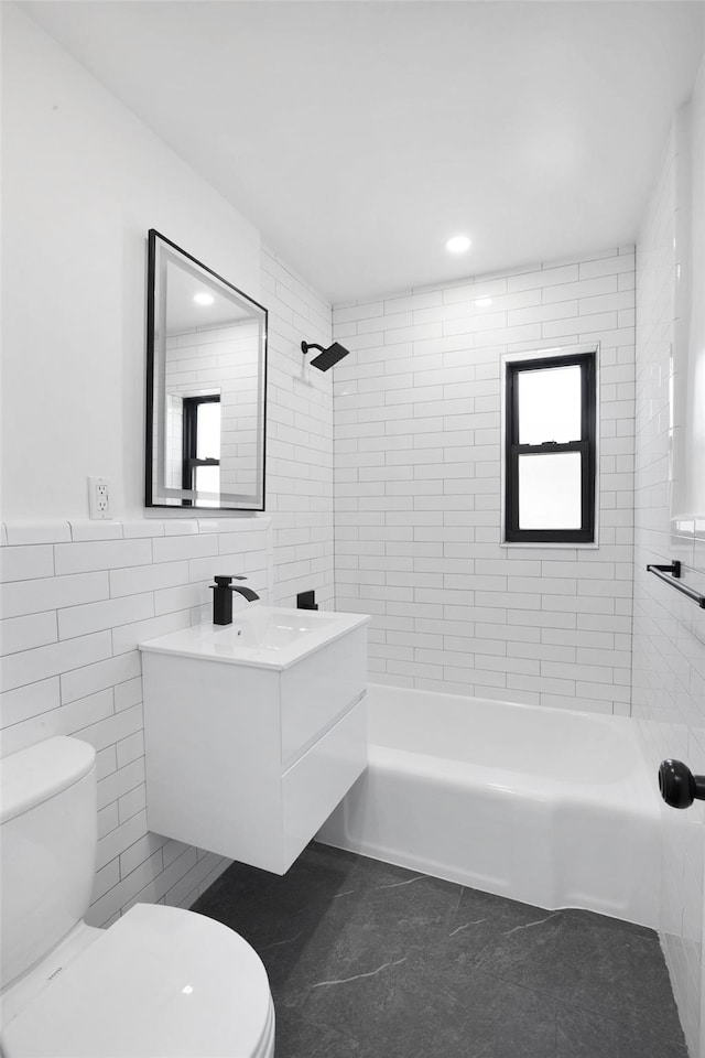 75-02 Springfield Blvd Fl 2Nd, Bayside, NY 11364 - bathroom with tile walls, vanity, tile patterned flooring, tub / shower combination, and recessed lighting
