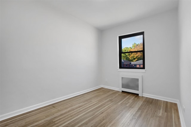 75-02 Springfield Blvd Fl 2Nd, Bayside, NY 11364 - unfurnished room with wood finished floors and baseboards