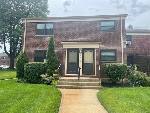 75-02 Springfield Blvd Fl 2Nd, Bayside, NY 11364 - townhome / multi-family property featuring brick siding and a front yard