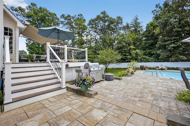 15 E Salem Rd, Fishkill, NY 12524 - fenced backyard featuring stairway, a patio area, a deck, and a grill