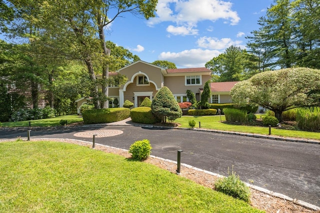 10 Faulkner Ln, Dix Hills, NY 11746 - view of front of home featuring a front yard