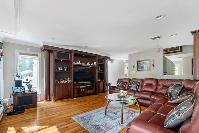 10 Faulkner Ln, Dix Hills, NY 11746 - living room featuring light wood finished floors, crown molding, and recessed lighting