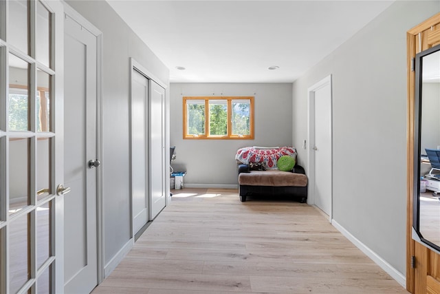 10 Faulkner Ln, Dix Hills, NY 11746 - living area featuring light wood-style flooring and recessed lighting