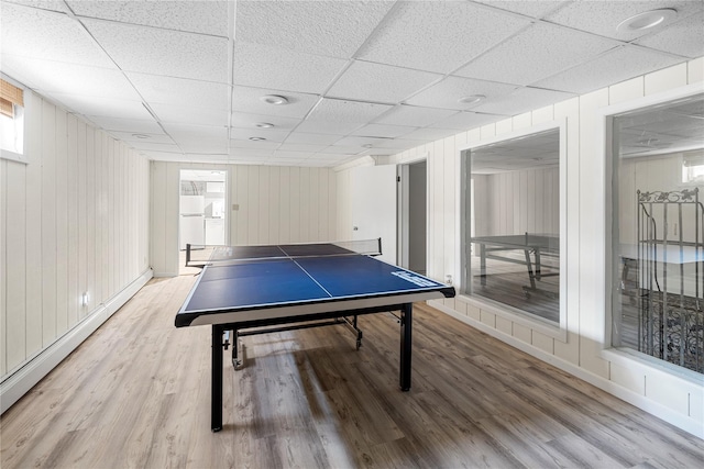 10 Faulkner Ln, Dix Hills, NY 11746 - playroom featuring light wood-type flooring and a drop ceiling
