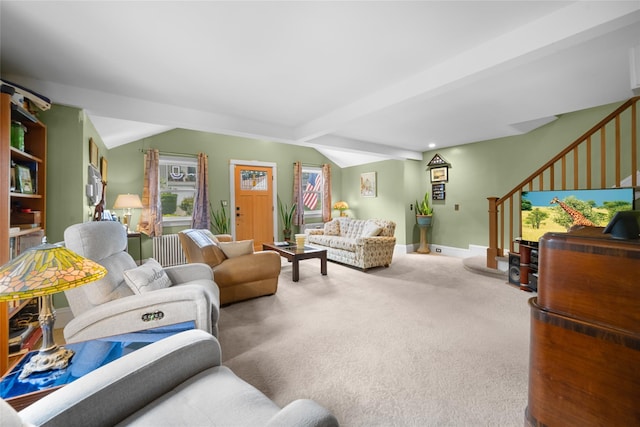 27 Neulist Ave, Port Washington, NY 11050 - living area featuring stairway, carpet flooring, and lofted ceiling