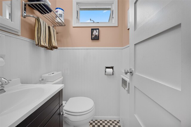 27 Neulist Ave, Port Washington, NY 11050 - half bath with wainscoting and vanity