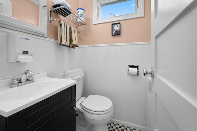 27 Neulist Ave, Port Washington, NY 11050 - half bathroom with a wainscoted wall and vanity