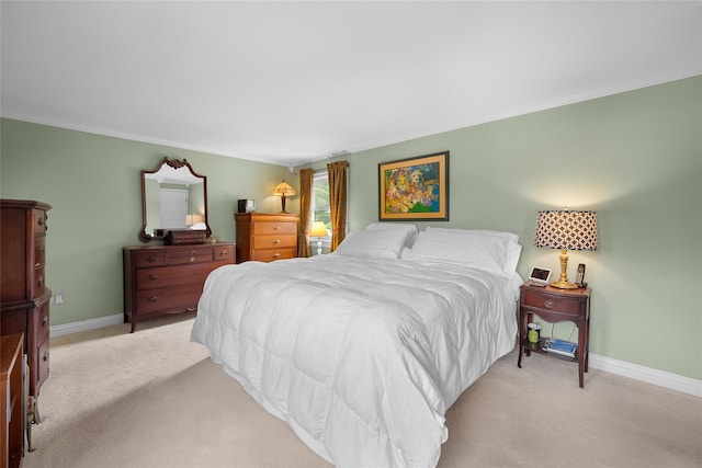 27 Neulist Ave, Port Washington, NY 11050 - bedroom with light carpet and crown molding