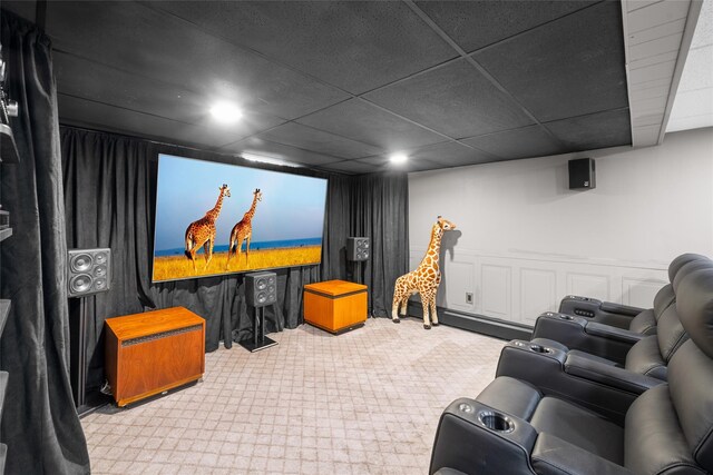 27 Neulist Ave, Port Washington, NY 11050 - carpeted home theater featuring a paneled ceiling and recessed lighting