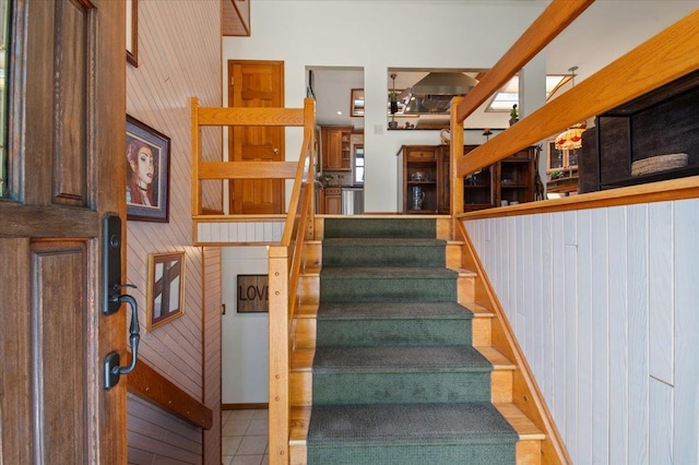 713 Thomas Ave, Baldwin, NY 11510 - staircase featuring wooden walls