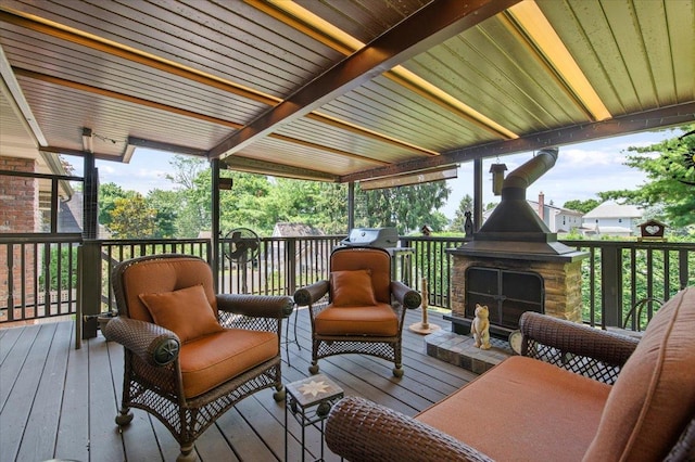 713 Thomas Ave, Baldwin, NY 11510 - wooden deck featuring an outdoor stone fireplace