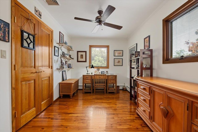 713 Thomas Ave, Baldwin, NY 11510 - office area with wood finished floors, ceiling fan, and crown molding