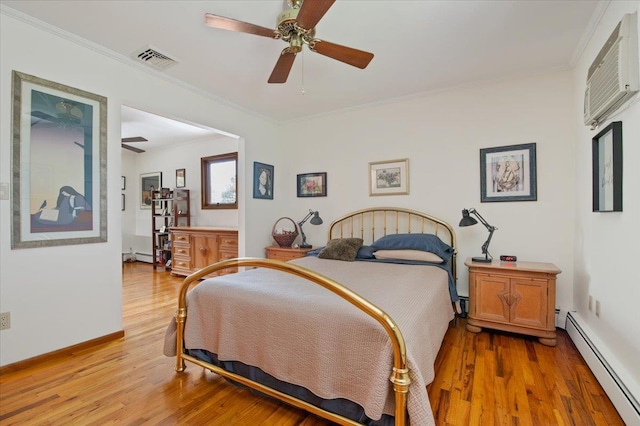 713 Thomas Ave, Baldwin, NY 11510 - bedroom featuring a baseboard radiator, light wood-style flooring, ornamental molding, and ceiling fan