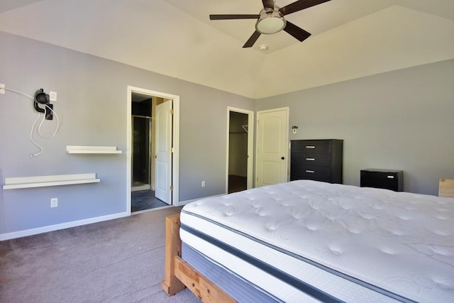 49 Cornwall Ln, Middletown, NY 10940 - carpeted bedroom featuring a walk in closet, connected bathroom, ceiling fan, and lofted ceiling